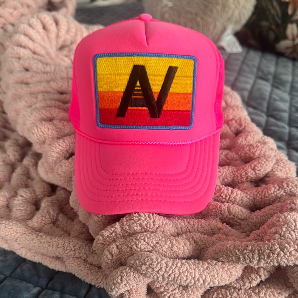 Vibrant Pink and Red Trucker Hat with Emblem